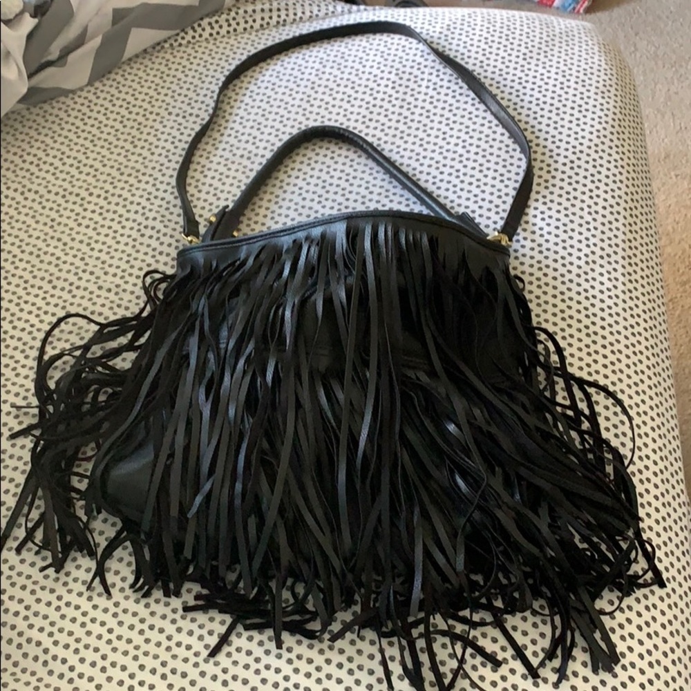 Women’s black fringe purse